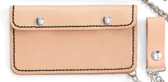 Beige leather wallet with metal studs and keychain on a white background