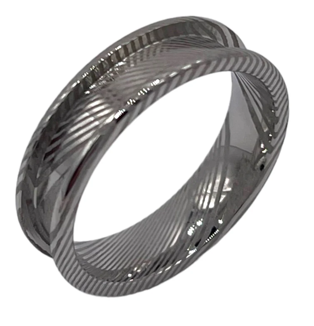 Stainless_Demascus ring with a textured design on a white background