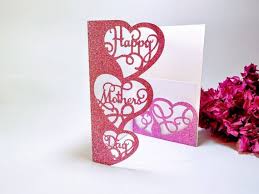 Card with heart designs and 'Happy Mother's Day' text on a white background with pink flowers.