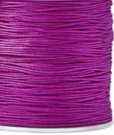 Close-up of purple thread spool