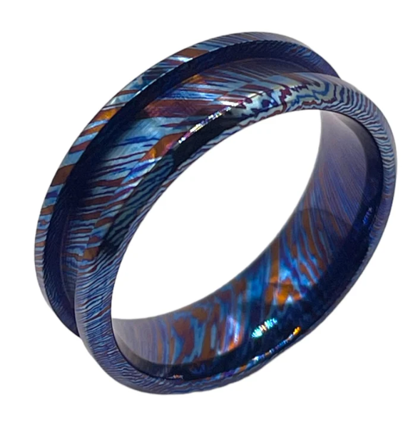 titanium_damascus Blue and purple patterned ring on a white background